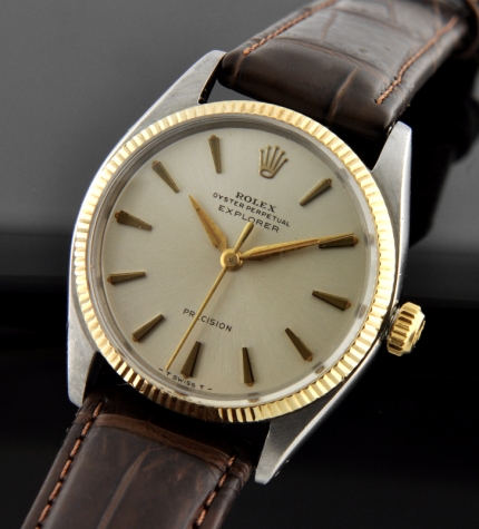 1963 Rolex Oyster Perpetual Explorer Precision stainless steel watch with original two-tone case, dial, markers, and automatic movement.