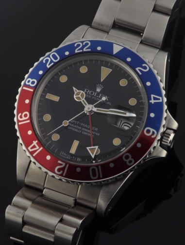 1981 Rolex Oyster Perpetual GMT-Master stainless steel watch with original glossy black dial, hands, case, and clean caliber 3075 movement.