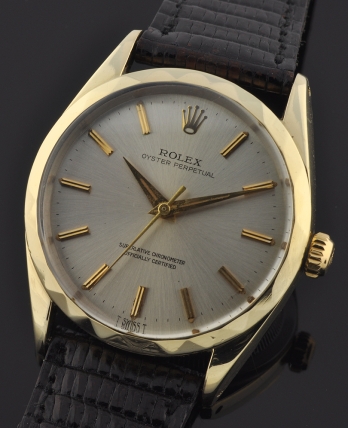 1963 Rolex Oyster Perpetual gold-capped watch with original diamond-beveled bezel, Dauphine hands, and cleaned automatic winding movement.