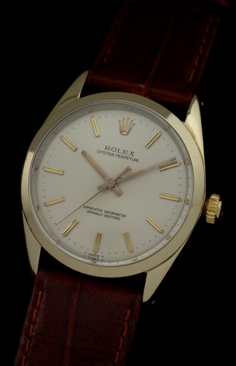 1964 Rolex Oyster Perpetual gold-capped watch with original winding crown, polished bezel, hands, and clean caliber 1570 automatic movement.