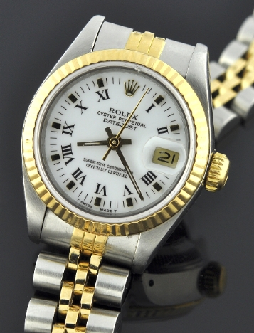1987 Rolex Oyster Perpetual Datejust stainless steel and gold watch with original two-tone case, Jubilee bracelet, and white Roman dial.