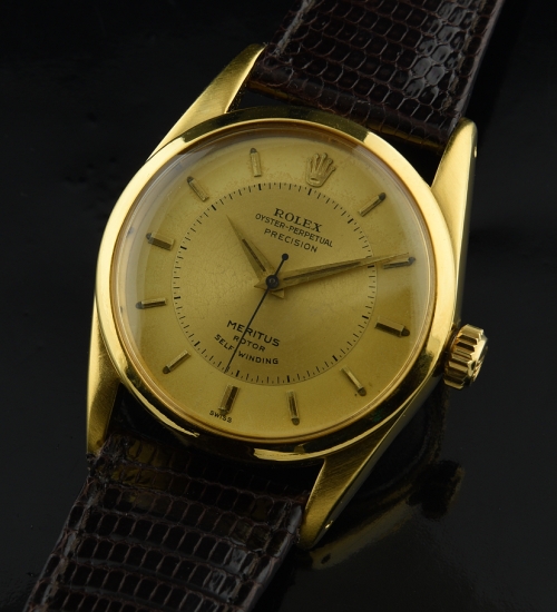 1956 Rolex Oyster-Perpetual Precision Meritus gold-plated watch with original case, lugs, winding crown, hands, and caliber 1030 movement.