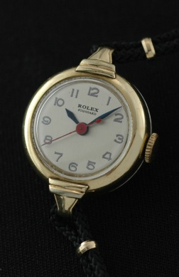 1941 Rolex Standard stainless steel nurses' military watch with original 24-hour scale, Arabic numerals, pencil hands, and cleaned movement.