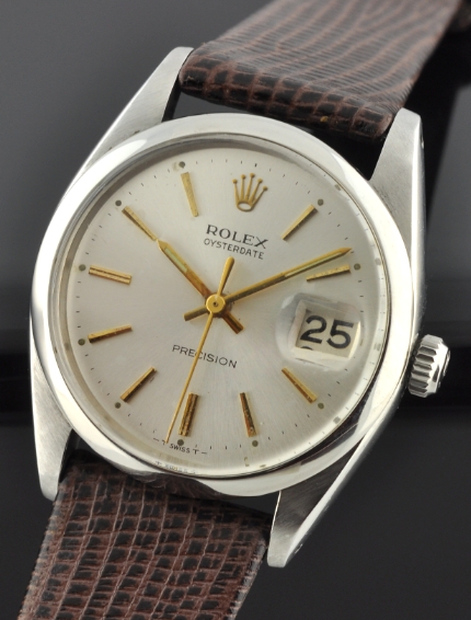 1966 Rolex Oysterdate Precision stainless steel watch with original silver dial, baton hands, scratchless bezel, and caliber 1215 movement.