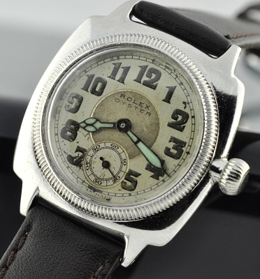 1930s Rolex Oyster stainless steel watch with original three-piece case, coin-edge bezel, onion winding crown, and manual winding movement.