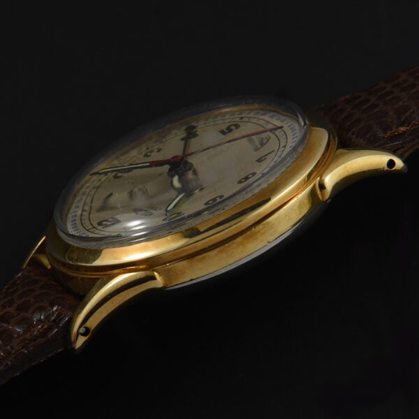 This is a gold filled Vulcain Cricket alarm watch from the 1950s measuring 33.5mm. The alarm buzzes away quite nicely.