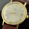 1950s Eterna-Matic 3000 18k solid-gold watch with original lugs, heavy case, dial, elongated markers, Dauphine hands, and cleaned movement.