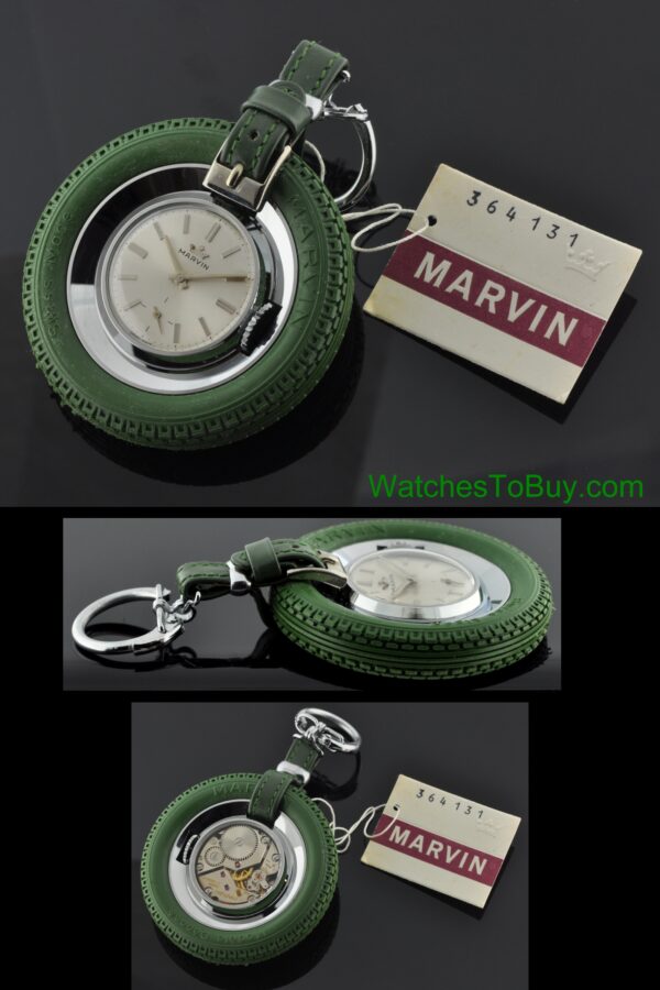 1960s Marvin stainless steel Dunlop Tires promotional watch with original rubber tire, see-through case back, and manual winding movement.