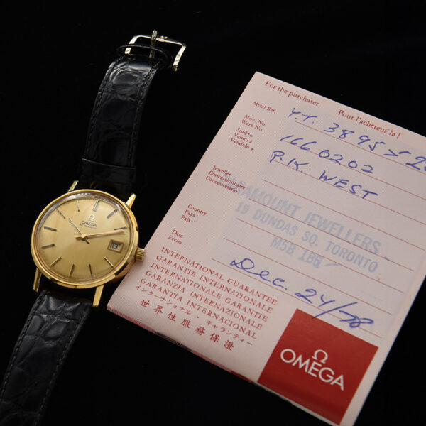 This is a 1974 gold-plated steel-back Omega automatic dating to 1974 complete with inner and outer box and signed guarantee papers.