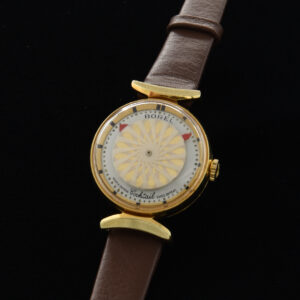 This is a vintage ladies 1960s Borel cocktail watch measuring 25mm in a gold-plated see-through back case.