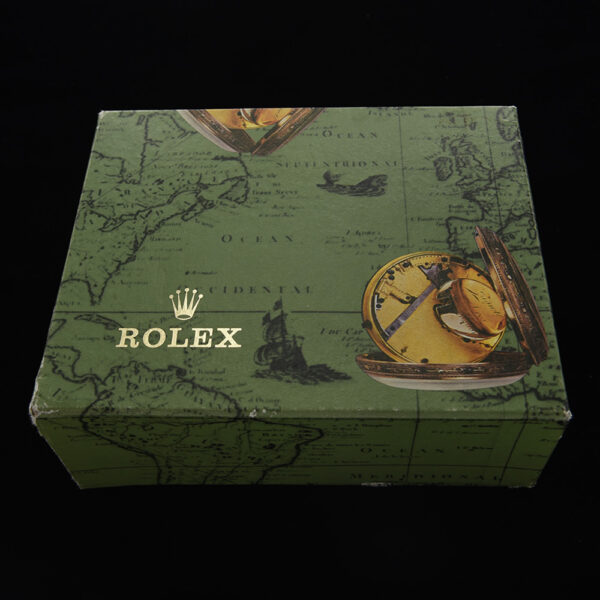 This 4x5" Rolex package comes with both inner and outer box, polishing cloth, papers and holder for a Rolex Submariner 16610.