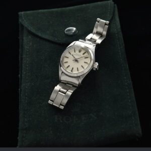 This ladies 1973 Rolex Oyster Perpetual watch displays amazing condition for its age. The 25mm (demure) stainless steel case comes from an era when ladies watches were subtle.