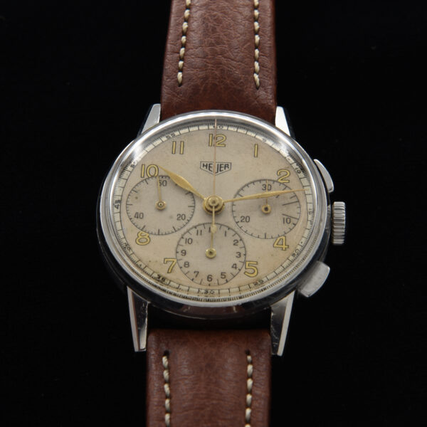 This is a ref. 2443 vintage 1940s Heuer Chronograph housing the famed and beautiful (just serviced) Valjoux caliber 72 column wheel chronograph movement.