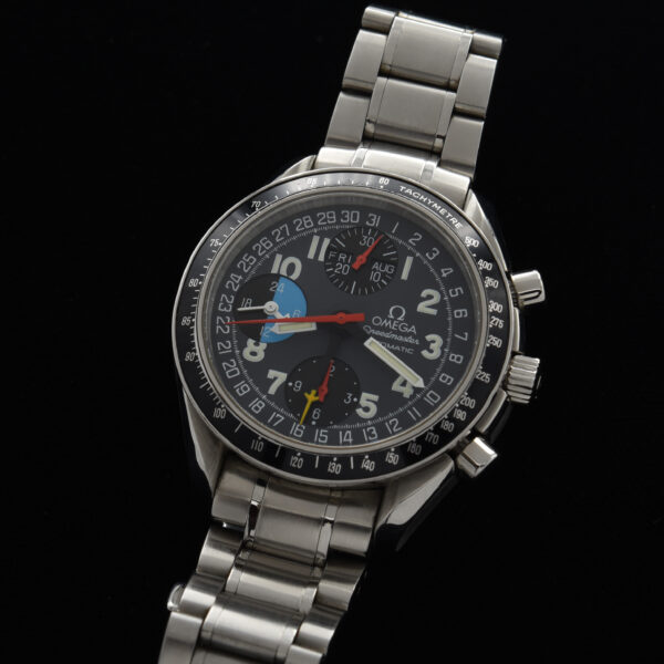 This is a ref. 3520.53.00 Omega Speedmaster measuring 39mm in all stainless steel. This watch dates to about 1995.