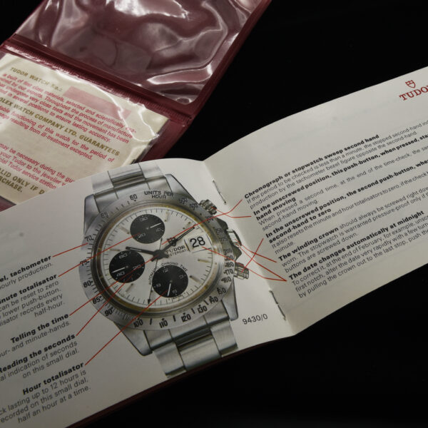 This is an early 1980s Tudor vinyl holder with open papers and instruction booklet for many vintage Tudor watches including the chronographs and Submariner.