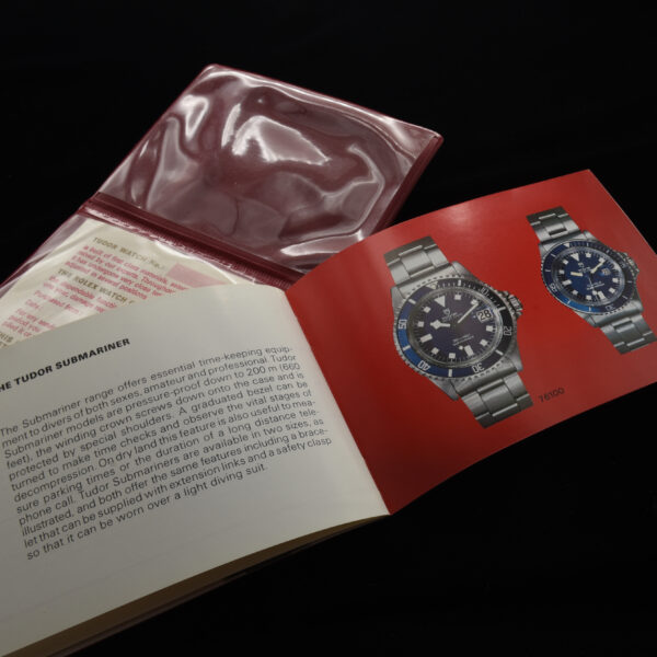 This is an early 1980s Tudor vinyl holder with open papers and instruction booklet for many vintage Tudor watches including the chronographs and Submariner.