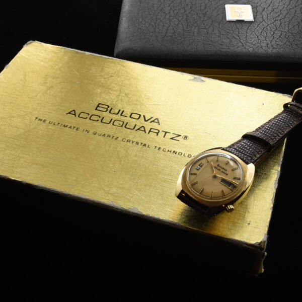 This is a 36mm, solid gold Bulova Accuquartz time capsule dating to 1972. This watch is literally pristine and comes complete with the original and rare box (filled out) papers and even battery receipts.