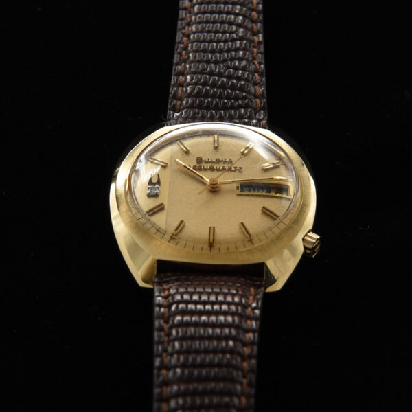 This is a 36mm, solid gold Bulova Accuquartz time capsule dating to 1972. This watch is literally pristine and comes complete with the original and rare box (filled out) papers and even battery receipts.