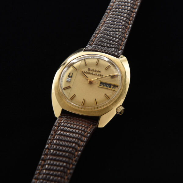 This is a 36mm, solid gold Bulova Accuquartz time capsule dating to 1972. This watch is literally pristine and comes complete with the original and rare box (filled out) papers and even battery receipts.