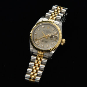 This is an exceptional ladies 1988 Rolex Datejust with a factory original diamond, Jubilee dial. The Jubilee dial (Rolex motif on the dial) was discontinued and has been recently brought back due to demand.