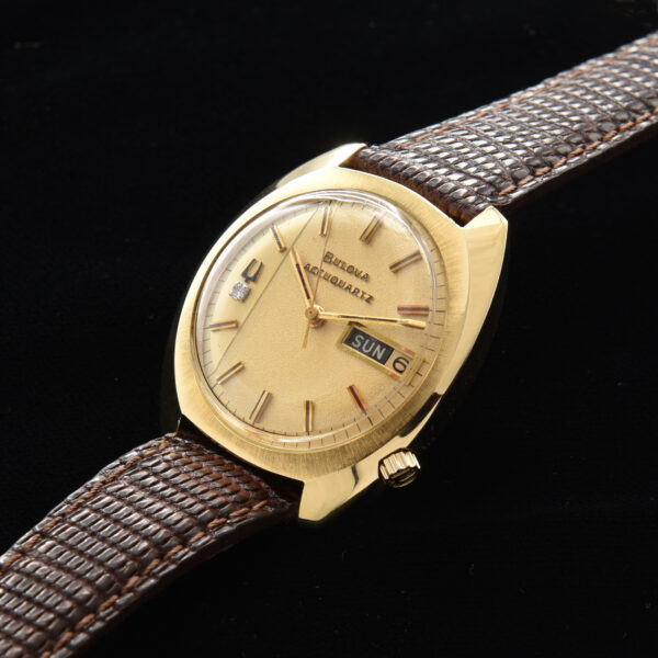 This is a 36mm, solid gold Bulova Accuquartz time capsule dating to 1972. This watch is literally pristine and comes complete with the original and rare box (filled out) papers and even battery receipts.