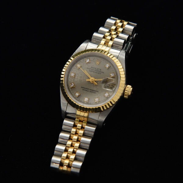 This is an exceptional ladies 1988 Rolex Datejust with a factory original diamond, Jubilee dial. The Jubilee dial (Rolex motif on the dial) was discontinued and has been recently brought back due to demand.