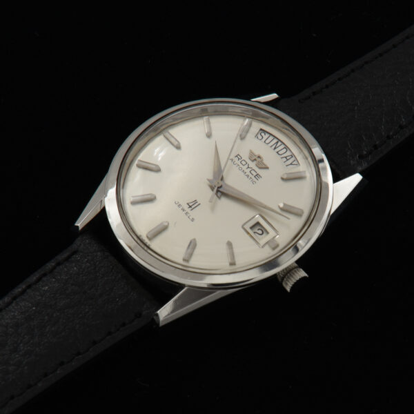 You don't find these large 37mm sleek watches often! This is an uncommon large stainless steel Royce (accurate) automatic winding watch housing a Swiss 41 jewel automatic winding movement.