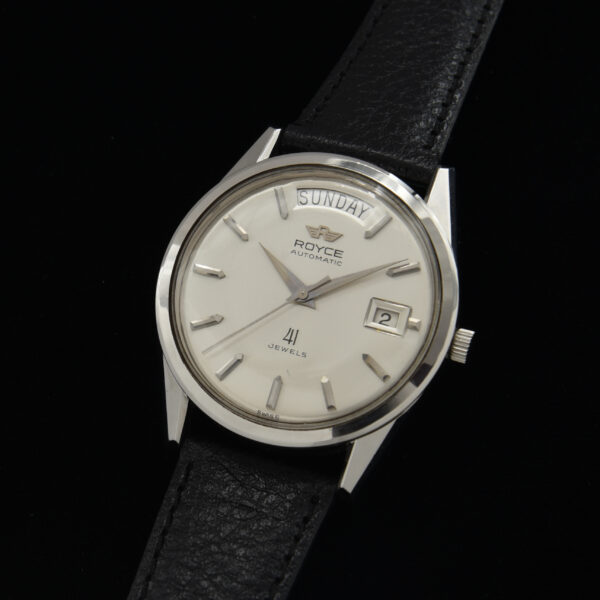 You don't find these large 37mm sleek watches often! This is an uncommon large stainless steel Royce (accurate) automatic winding watch housing a Swiss 41 jewel automatic winding movement.