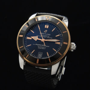 This is a 2018 Breitling Superocean Heritage B20 Automatic 42mm steel and red gold watch complete with box and papers.