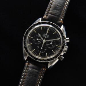 Here is a 1967 Omega Speedmaster 145.012 Cal 321 Pre-Moon stainless steel vintage 42mm watch. This watch is honest; having the original and rare dot-over-90 bezel.