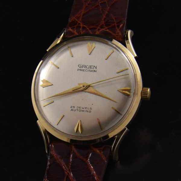 Here is a solid-14k-gold vintage Gruen watch housing an automatic winding Gruen movement which has just been serviced. The solid-gold case measures 32.75mm.