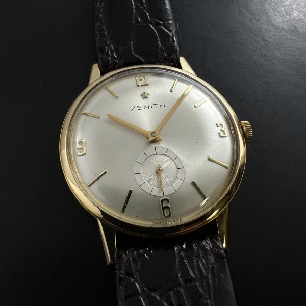 Here is a 1960s 7.5mm thin 34mm 18k solid gold Zenith manual winding watch known as the Stellina.