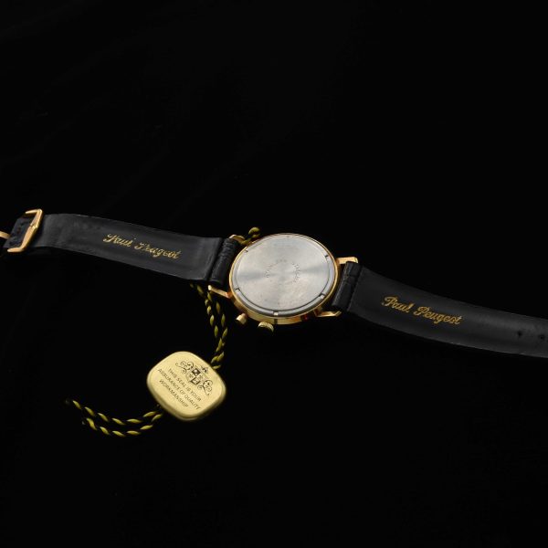 This is such a cool find that came from a jeweller's unused and unsold 1970s stock! This Paul Peugeot manual winding chronograph watch measures 34mm in a gold-plated case with stainless steel screw-back.