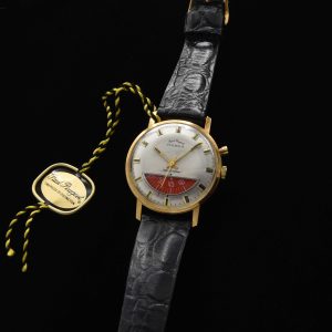 This is such a cool find that came from a jeweller's unused and unsold 1970s stock! This Paul Peugeot manual winding chronograph watch measures 34mm in a gold-plated case with stainless steel screw-back.