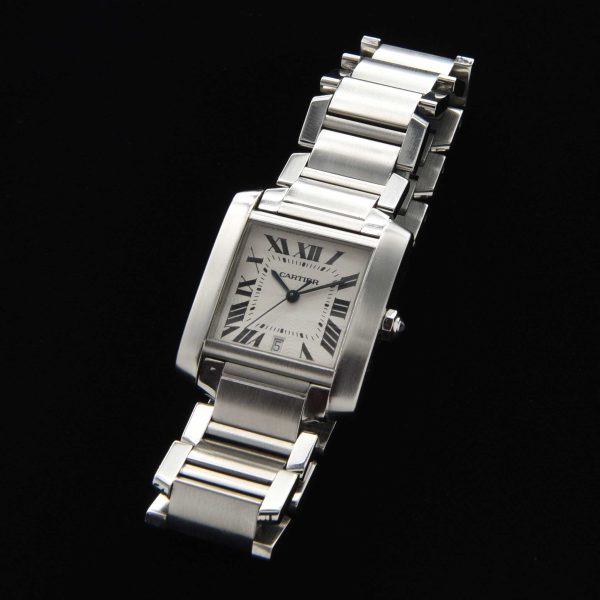 This is a Cartier Tank Francaise men's watch dating to the 2000's. This all-stainless-steel Cartier measures 28x32mm, which is the large size in this model.