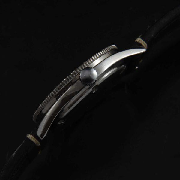 This is a very uncommon vintage 1960s Elgin Dive watch having a very cool radium dial. The Mercedes hands were replaced at some time and really suit the watch.