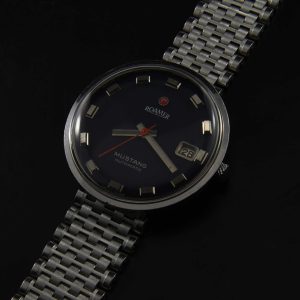 This is a very large 38mm 1970s vintage watch produced by the Swiss company "Roamer". The automatic Swiss movement was just serviced and running perfectly.