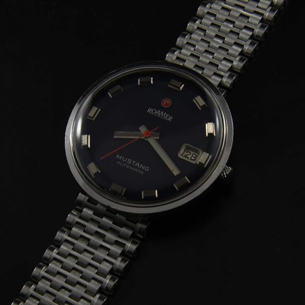 This is a very large 38mm 1970s vintage watch produced by the Swiss company "Roamer". The automatic Swiss movement was just serviced and running perfectly.