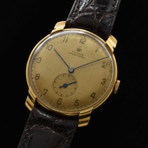 This is the rarest of all the Rolex watches I have posted this year. This ref. 4118 solid-18k-gold Rolex is chronometer grade with its very fine (and just serviced) manual winding 18 jewel Rolex movement having six adjustments.