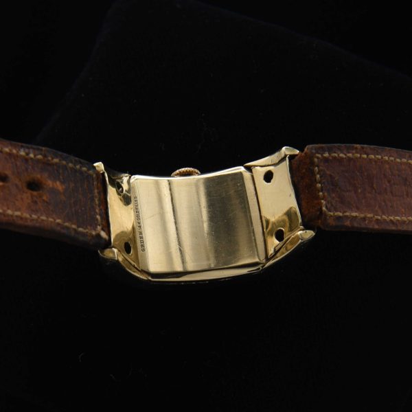 This is a very uncommon 1938 Gruen Extreme Driver’s watch known as the “edge-of-wrist watch” measuring 20x37mm with its 14k-gold-filled highly curved case.