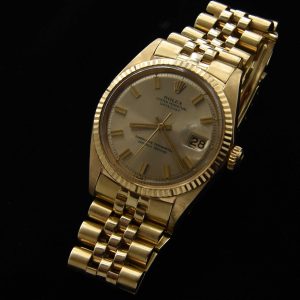 This incredibly preserved 1969 Rolex Datejust measuring 36mm in solid-14k-gold comes complete with its box and original guarantee certificate having matching punched serial numbers.