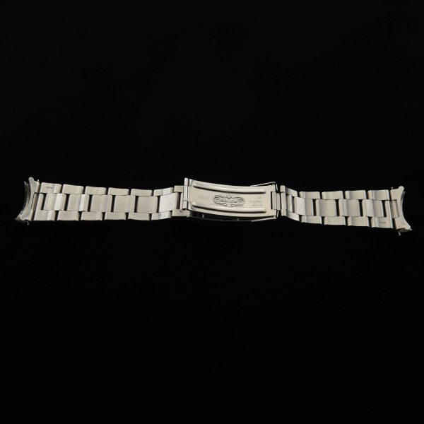 This is an amazingly tight and very clean solid-link-20mm Rolex Oyster stainless steel fliplock bracelet measuring almost 6 3/4".