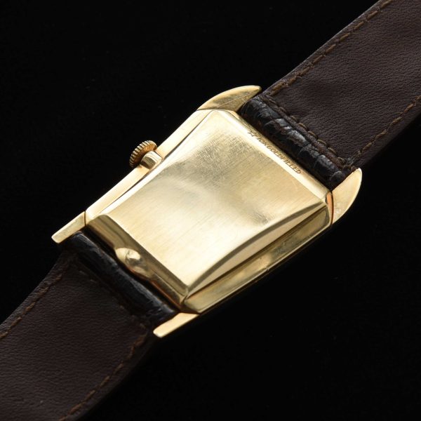 This is an interesting and uncommon '50s Wittnauer known as the 'grasshopper' because of its shape resembling the head of the insect.