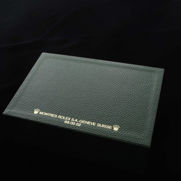 This is a Rolex 68.00.02 Inner And Outer Box with pillow and felt wrap in excellent condition. The outer box has 16710 sticker. This box was used for a number of the Rolex Sport models.