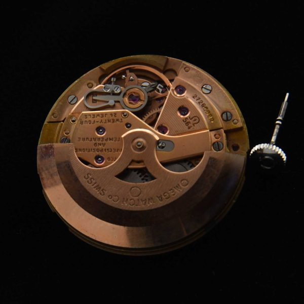 This is an original textured dark-silver Omega Constellation (original) dial and hands with its cal. 564 (working) movement.