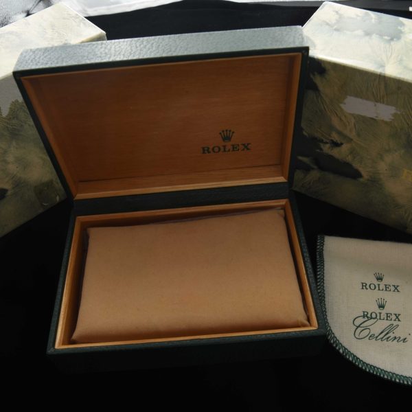 This is a Rolex 68.00.02 Inner And Outer Box with pillow and felt wrap in excellent condition. The outer box has 16710 sticker. This box was used for a number of the Rolex Sport models.
