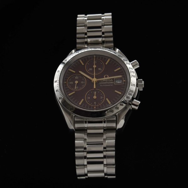 This is a very uncommon reference 3511.61 Omega Speedmaster with a seldom seen burgundy dial and known as the 'Marui', and was sold in Japan in very limited numbers in the '90s. 