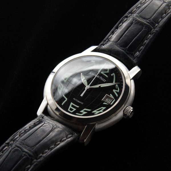 This is an uncommonly found Audemars Piguet model known as the 'Jules'; housed in a heavy 39mm 18k-white-gold case, 15mm thick and 44mm lug-to-lug.
