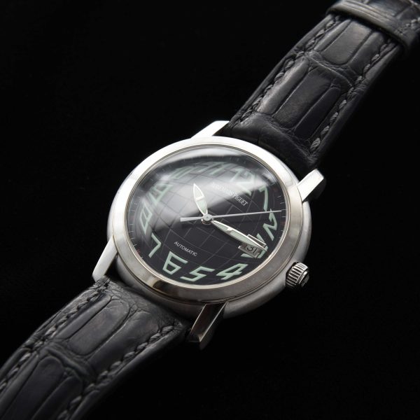This is an uncommonly found Audemars Piguet model known as the 'Jules'; housed in a heavy 39mm 18k-white-gold case, 15mm thick and 44mm lug-to-lug.