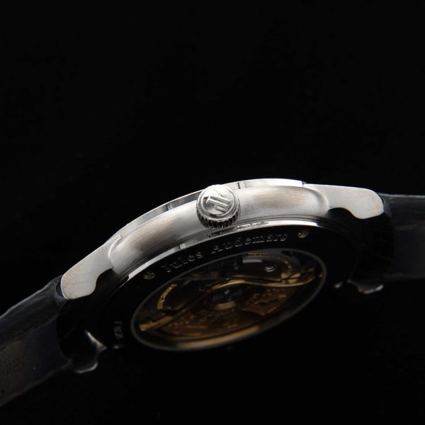 This is an uncommonly found Audemars Piguet model known as the 'Jules'; housed in a heavy 39mm 18k-white-gold case, 15mm thick and 44mm lug-to-lug.